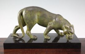 An Art Deco patinated metal model of a panther, on rectangular black marble base, signed Rochard,