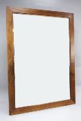 A pair of modern rectangular walnut framed wall mirrors, 6ft 2.5in. x 4ft 7in.