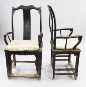 A pair of Chinese elm arm chairs, with single shaped splat back above panelled seat, with shaped