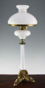 A late Victorian ormolu and opaline glass oil lamp, with white glass shade, overall 27.5in.