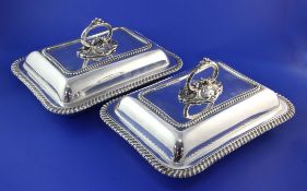 A pair of late Victorian silver rectangular entree dishes and covers with handles, by Mappin &