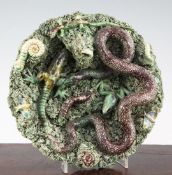 A Caldas Rainha Palissy style amphibian and reptile dish, late 19th century, modelled with a snake
