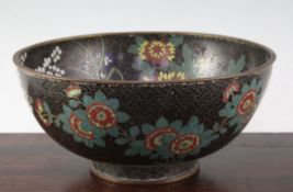 A Chinese cloisonne enamel bowl, late 19th century, decorated with prunus and flower blossoms on a