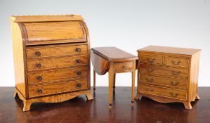 A Fergus Lane miniature George III style satinwood cylinder roll top desk, a similar chest of