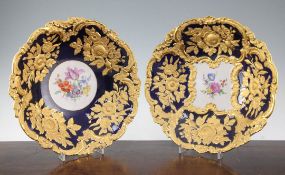 Two similar Meissen floral dishes, 20th century, each painted with a floral bouquet to the centre
