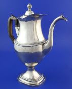 A 19th century Portuguese silver pedestal coffee pot, with reeded and gadrooned decoration and