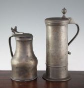 A large Continental pewter flagon, with wrigglework decoration and the date 1765, together with