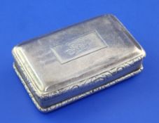 A George IV silver snuff box, of rectangular form, with reeded sides, engraved monogram to lid and