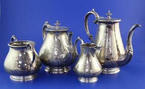 A Victorian silver four piece tea and coffee set, of baluster form, with beaded border and