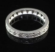 A platinum and diamond full eternity ring, set with twenty two round cut diamonds, size Q.