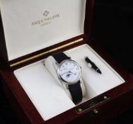 A gentleman's 18ct white gold Patek Philippe 'Officer's' wrist watch, model 5054G-001, the white