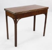 A George III mahogany rectangular card table, with folding top, on square section legs, W.3ft