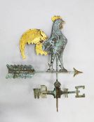 A 20th century copper weather vane, mounted with a cock, 2ft 1in.