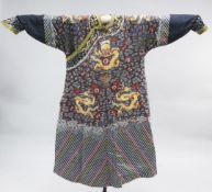 A Chinese Imperial silk gauze and metal thread 'nine dragon' summer robe, late 19th / early 20th