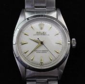 A gentleman's late 1950's stainless steel Rolex Oyster Perpetual wrist watch, with honeycomb dial