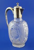 An Edwardian silver mounted cut glass claret jug by Goldsmiths & Silversmiths Co Ltd, of ovoid form,