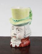 A Staffordshire pearlware Toby jug, c.1835, modelled as a bust of a gentleman wearing a yellow top