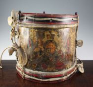 An early 20th century military brass drum for the Gloucestershire Regiment, decorated with battle