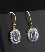 A pair of gold, blue topaz and diamond set cluster earrings, of shaped rectangular form, 0.5in.