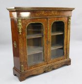 A Victorian walnut and floral marquetry inlaid side cabinet, with ormolu mounts, fitted with two