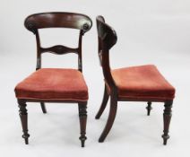 A set of six early Victorian mahogany dining chairs, with crescent shaped crest rails, single spar