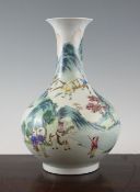 A Chinese famille rose pear shaped vase, painted with figures on horseback, following a camel and