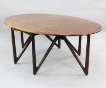 Kurt Ostervig for Jason Mobler, Denmark, 1960's. A rosewood drop-leaf dining table raised on