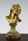 Jean Antoine Injalbert (French, 1845-1933). A 19th century gilt bronze bust of a smiling child, on