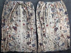 A pair of 1920's silk lined crewel work curtains, depicting birds, flowers and berries, 7ft 10ins