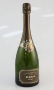One bottle of Krug 1976, level under 1cm; minor scuffs and nicks to label and foil.