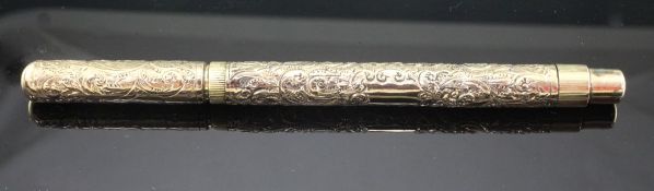 A De La Rue Onoto 9ct gold fountain pen with ornate foliate scroll decoration, 5.75in. cased.