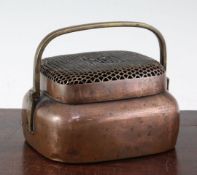 A Chinese copper bronze oblong hand warmer, 18th / 19th century, the top pierced with a square '