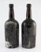 Two magnums of Taylor 1963, levels well into neck, remains of black wax embossed capsules, one