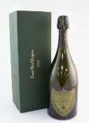 One bottle of Dom Perignon 1985, boxed, minor nick to label.