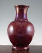 A large Chinese flambe glazed baluster vase, 18th / 19th century, predominantly of sang de boeuf