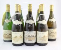 An eight bottle assortment of rare mature Vouvray sec and demi-sec from Domaine Huet featuring one