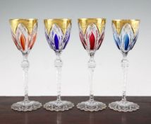 A set of four St Louis colour flash and cut hock glasses, 20th century, with panel cut colour