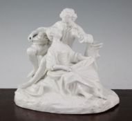 A Continental white glazed porcelain group of two lovers, late 19th century, he holding a rose and a