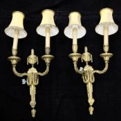 A pair of Louis XVI design twin branch ormolu wall lights, with central urn and swag, overall