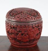 A Chinese cinnabar lacquer ovoid jar and cover, early 20th century, the body carved in high relief
