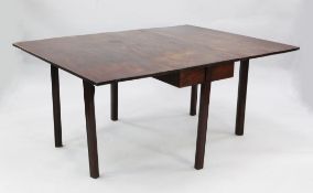 A George III mahogany drop leaf dining table, on moulded square section supports, extended 5ft 1.
