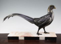 A French Art Deco patinated model of a pheasant, on a rectangular marble base, unsigned, 18in.