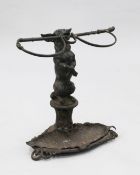 A Victorian Coalbrookdale cast iron umbrella stand, modelled as a begging dog with whip in his