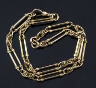 An Edwardian 15ct gold albert chain, with elongated and fancy links, 43 grams, 17in.