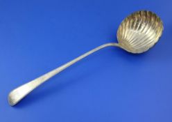 A George III silver beaded Old English pattern soup ladle, with shell bowl and engraved armorial,