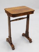 A William IV rosewood side table, with rectangular top on trestle end supports, W.1ft 6in.