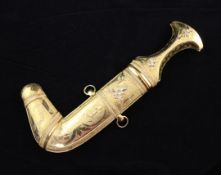 A Saudi Arabian antique Persian style high carat gold and diamond mounted presentation dagger, the