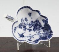 A Meissen 'Fels und Vogel' blue and white leaf shaped dish, c.1730, with stork shaped handle, the