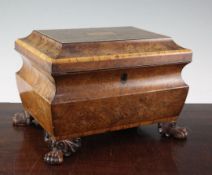 A 19th century rectangular burr yew wood two division tea caddy, the top inlaid with a central panel