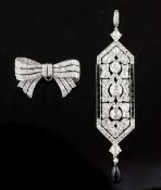 An attractive 1920's Cartier, platinum, diamond and black onyx drop pendant, of articulated